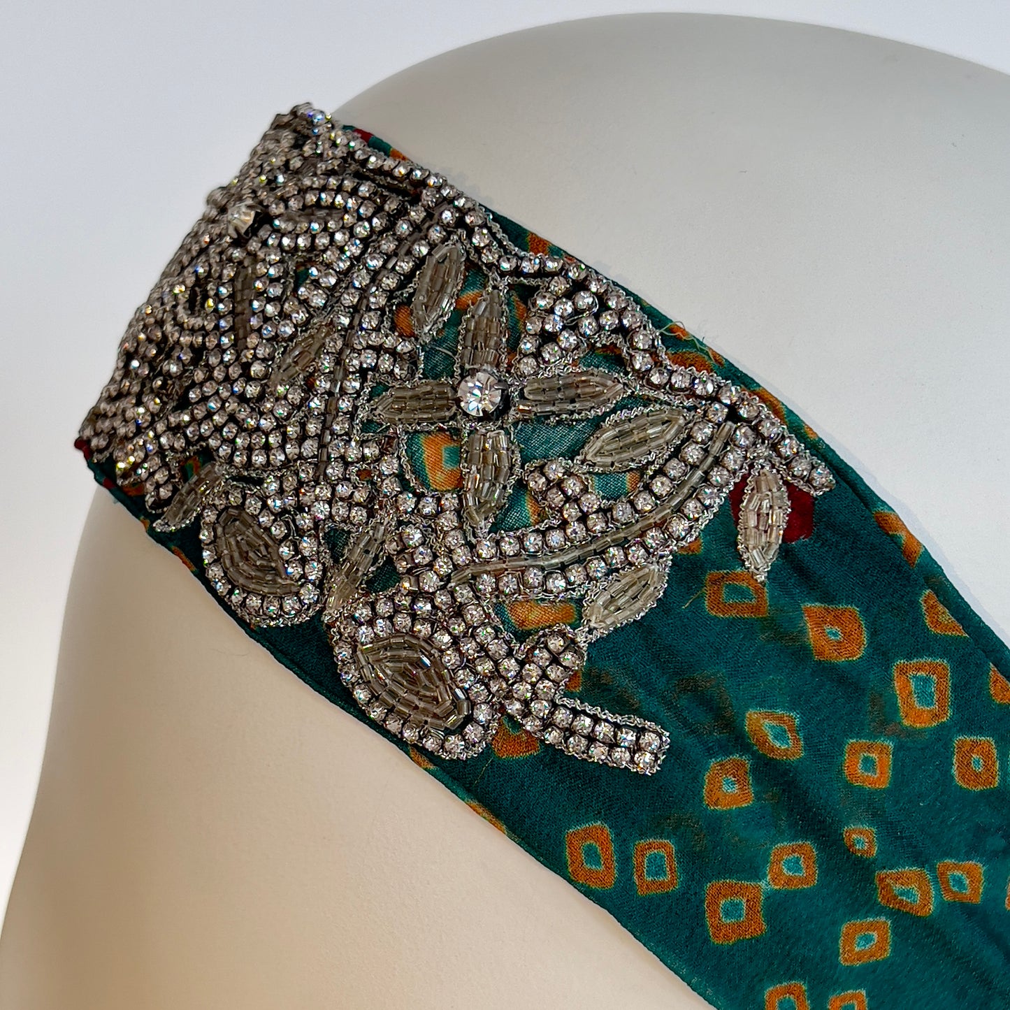 Green tie-dye headband with crystal embroidery, elastic back