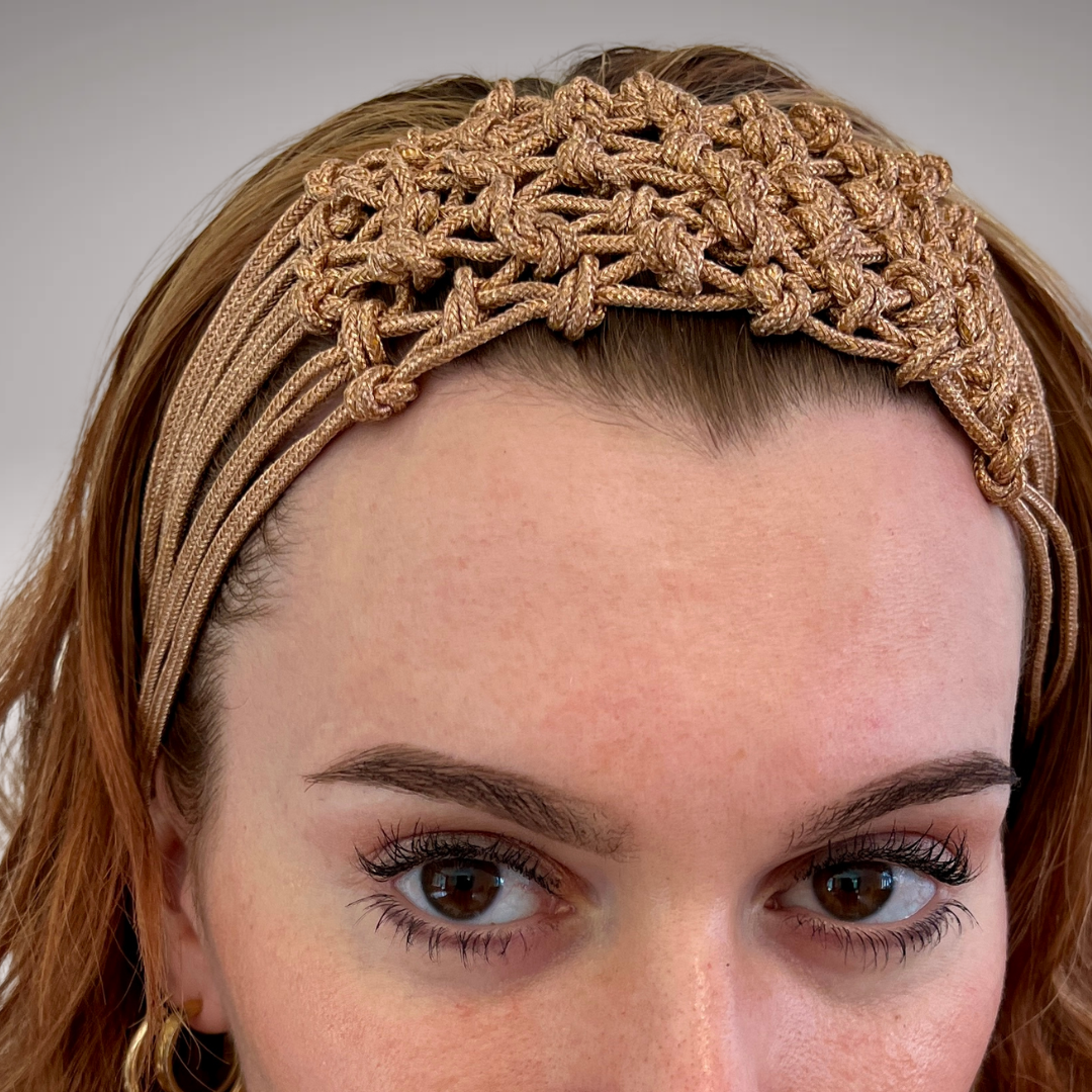 The Copperhead artisanal copper-knotted headband worn on the forehead, handcrafted luxury hair accessory by PERIPHERII