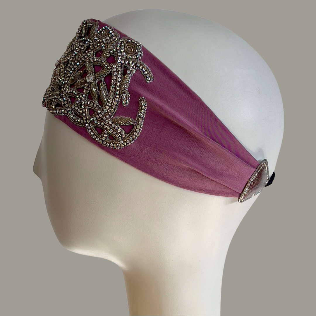 Hand embroidered lavender and silver crystal headband with elastic back.