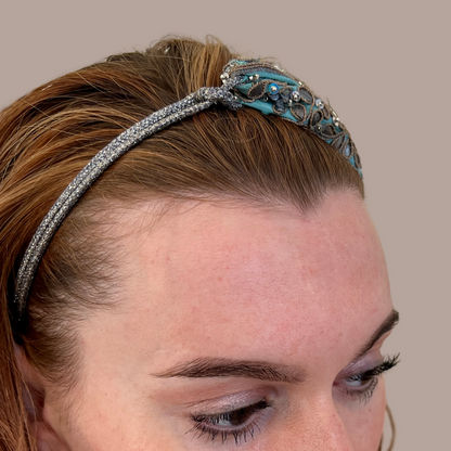 Cord view, asymmetric aqua embroidered headband with sequins, metallic appliqués, elastic back