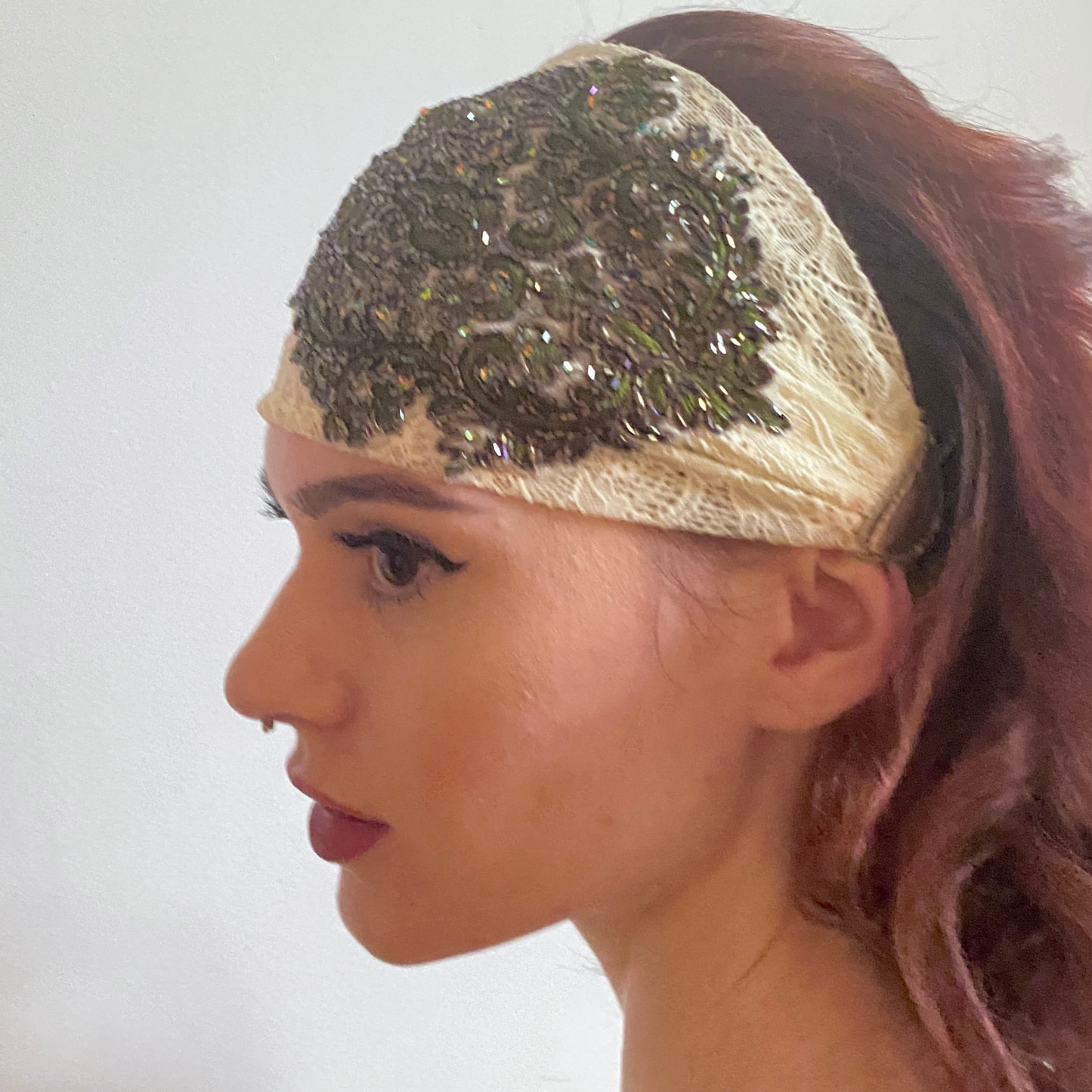 Stretch lace headband with embroidered appliqué