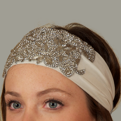 Hand embroidered ivory and silver crystal headband with elastic back. 