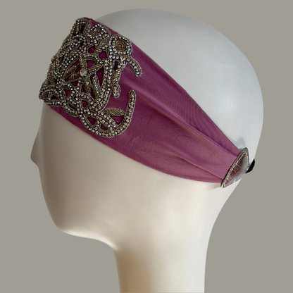 Hand embroidered lavender and silver crystal headband with elastic back. 