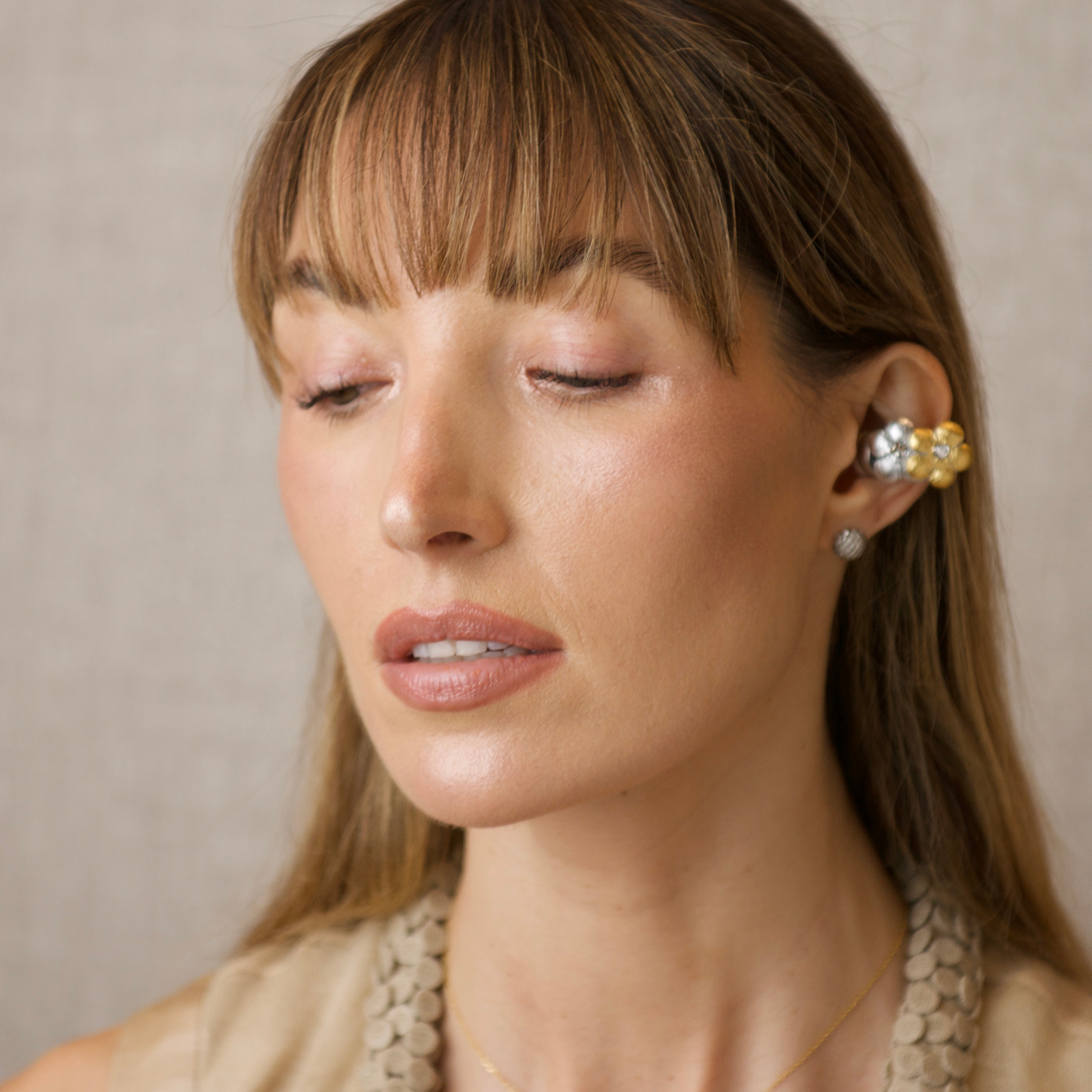 PRIAMBLE Mila Open-Ear Audio Earrings in Silver/Gold – Side View