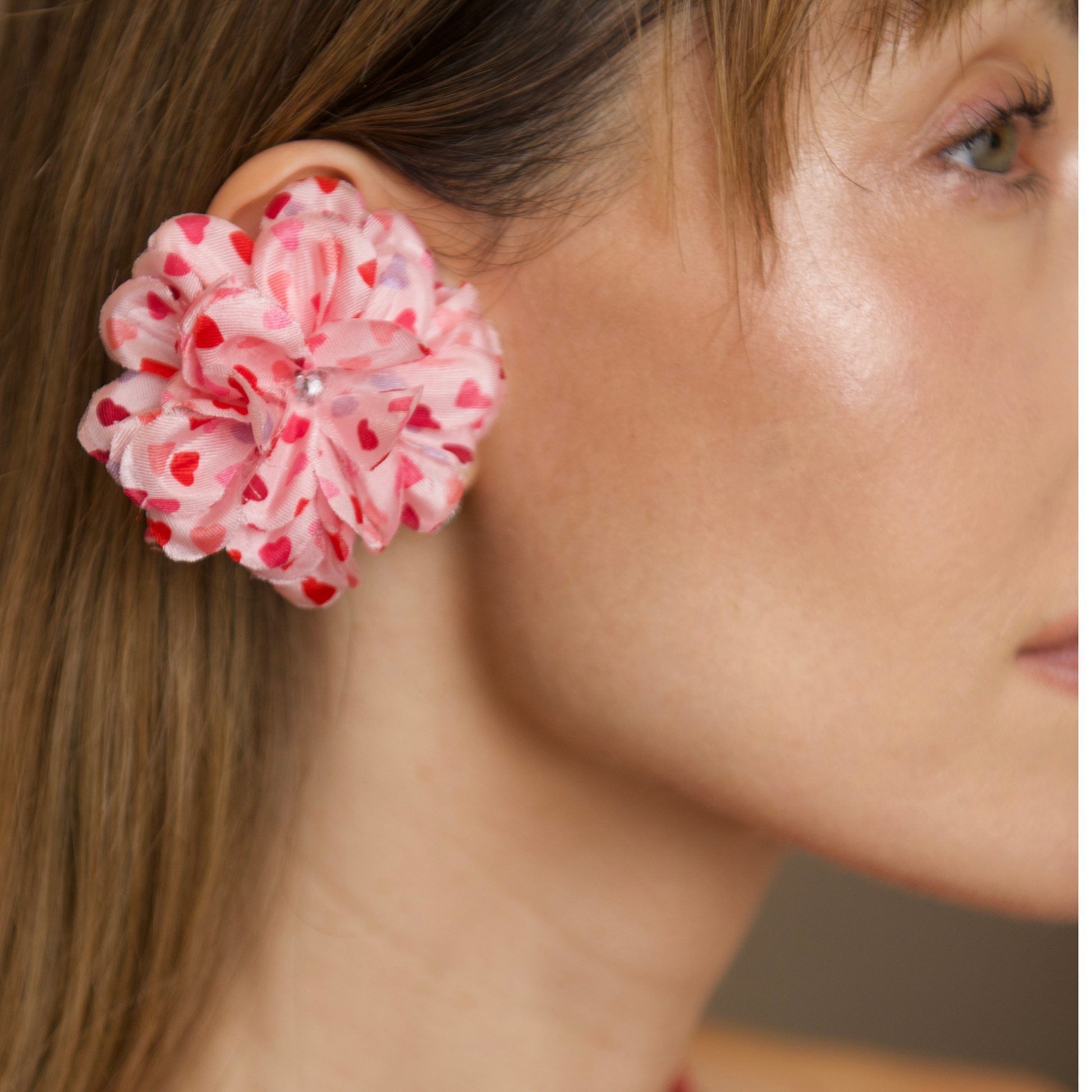 PRIAMBLE™ Blossom Audio Earrings in  heart petal close-up view by PERIPHERII