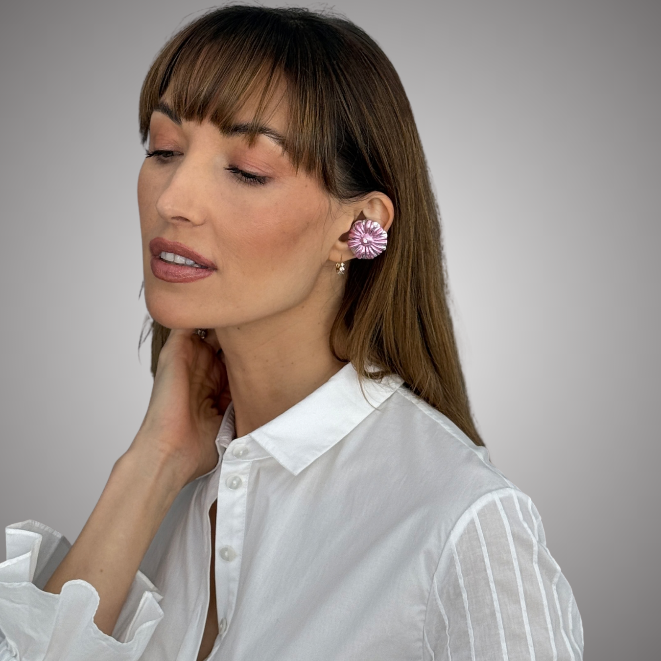 Priamble audio earrings that look like fine jewelry by peripherii in metallic pink and silver in style swati