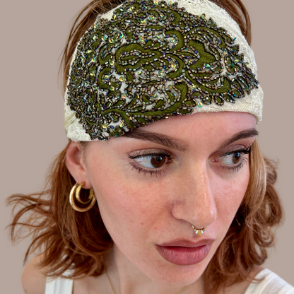 Woman wearing stretch lace applique headband peripherii