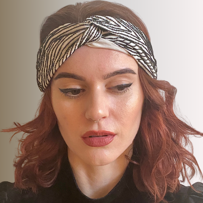 Woman in black and white bugle bead embroidered headband by Peripherii