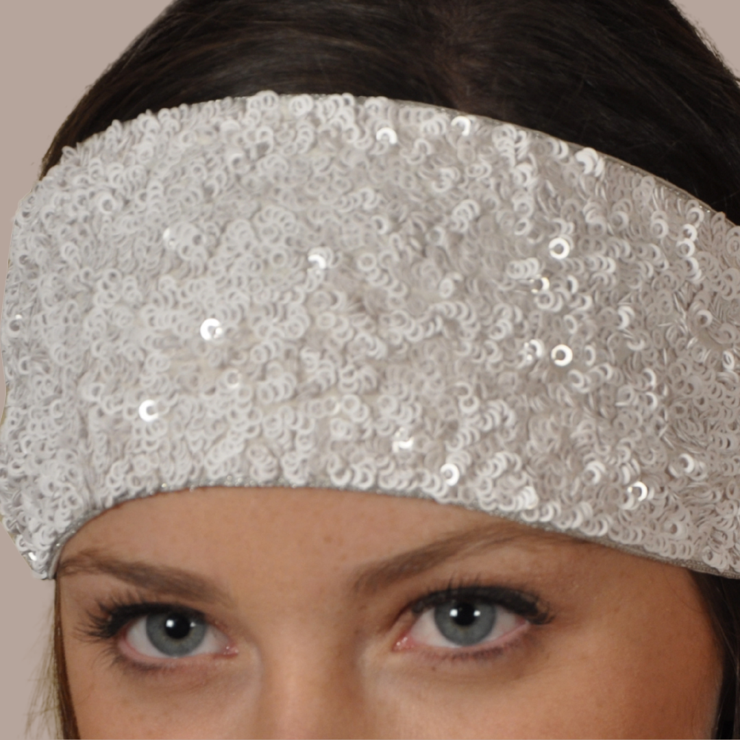 Woman in wide ivory sequin covered headband with elastic back by peripherii