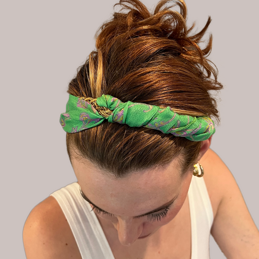 PERIPHERII The Verdana close-up of green silk woven through gold braid crown detail